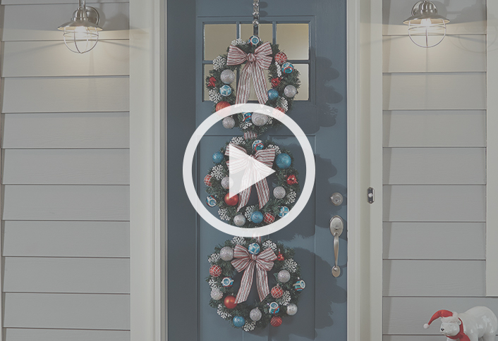 What are some options for how to attach a door wreath to a metal door?