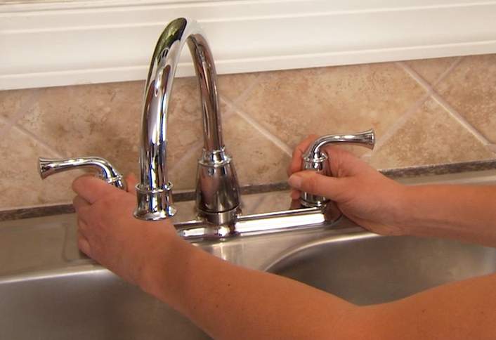 builder put faucet on side of kitchen sink