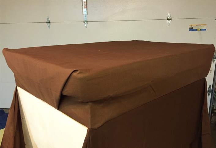 How To Build A Storage Ottoman At The Home Depot Staple fabric to lid - How to Build Storage Ottoman - How To Build A Storage Ottoman At The Home Depot