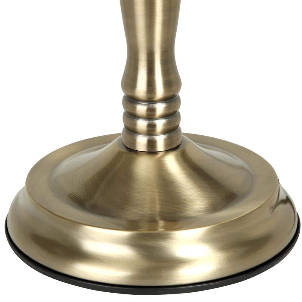 Lamp featuring a brushed gold finish on the base