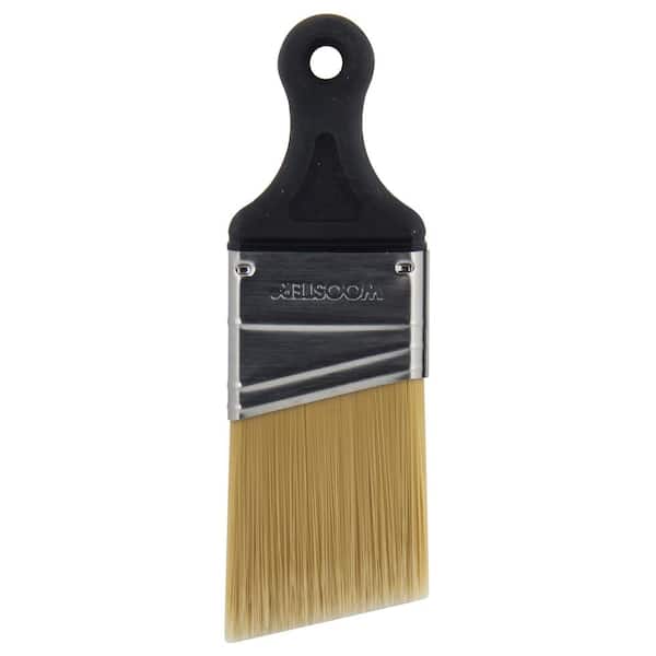 Angled paint brush that makes it easy to apply paint with precision